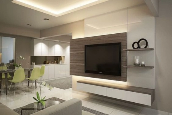 A TV unit in the centre and open shelves in the living room